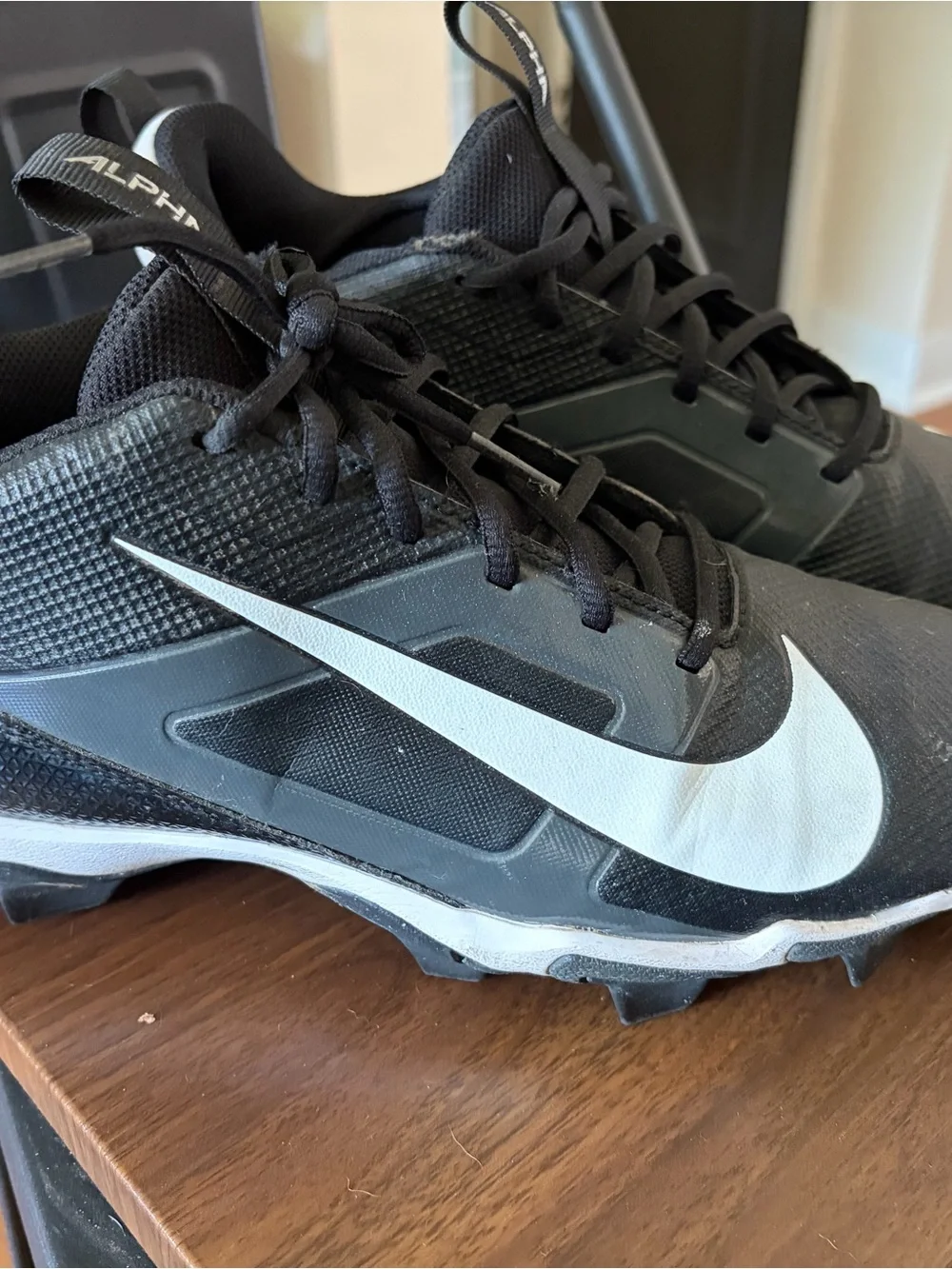 Nike Black and White Alpha Cleats